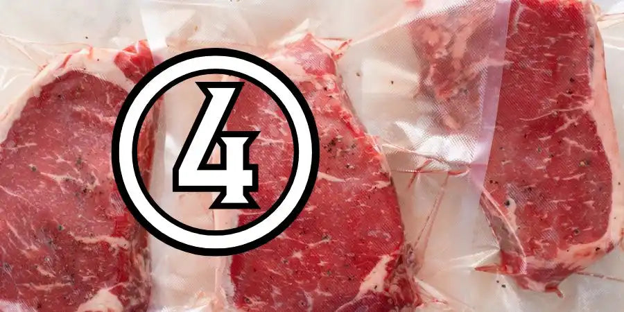 4-pack premium beef steaks, marbled red and white meat.